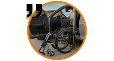 Sistema per caricare sedie a rotelle